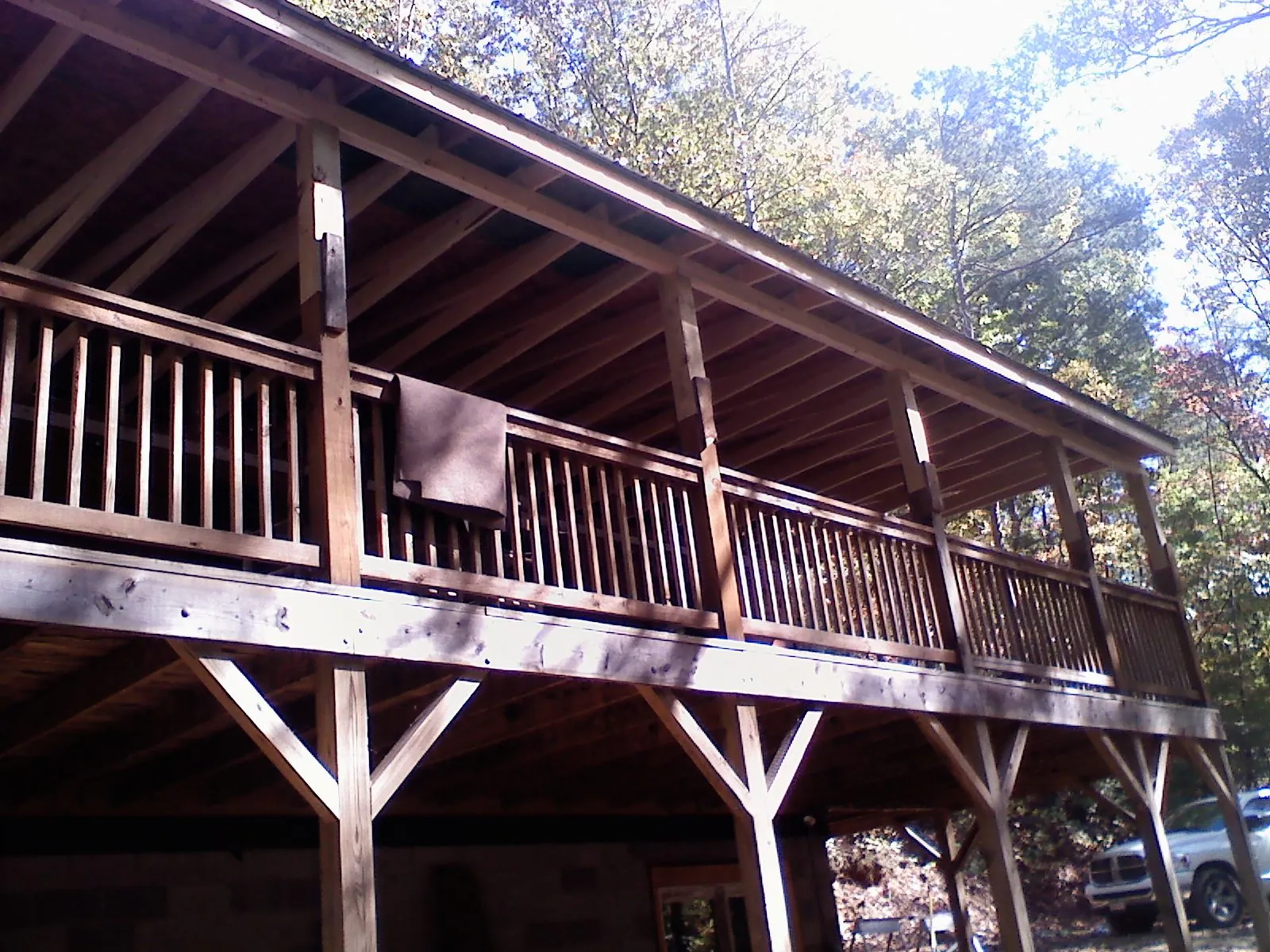 Timber framing under a new elevated porch and deck — Roof Leak Repair in Cedar by Roofing Brothers